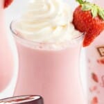 Pinterest pin showing a Strawberry Mudslide cocktail in a tall glass with whipped cream and a fresh strawberry garnish, with text reading “the best Strawberry Mudslide recipe!” and “Perfect indulgent treat!”