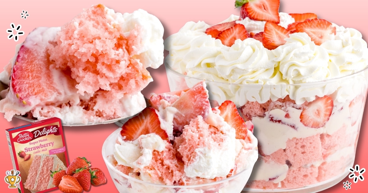 Layered strawberry trifle in a clear glass bowl with pink strawberry cake, creamy cheesecake-style filling, fresh sliced strawberries, and whipped topping, shown with a close-up spoonful scooped from the dessert.