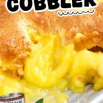 Lemon Cobbler dessert pin showing rich lemon filling bubbling beneath a golden baked cobbler crust. Text on image reads “Easy Lemon Cobbler” and “No-Fail recipe for lemon lovers!” alongside a can of lemon pie filling and lemon graphics.