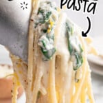 Pinterest image for Lemon Ricotta Pasta showing creamy ricotta-coated spaghetti with spinach being lifted with tongs. Text on the image reads: "Lemon Ricotta Pasta" and "Ready Under 30 Mins," with the Best Blog Recipes logo displayed at the bottom.