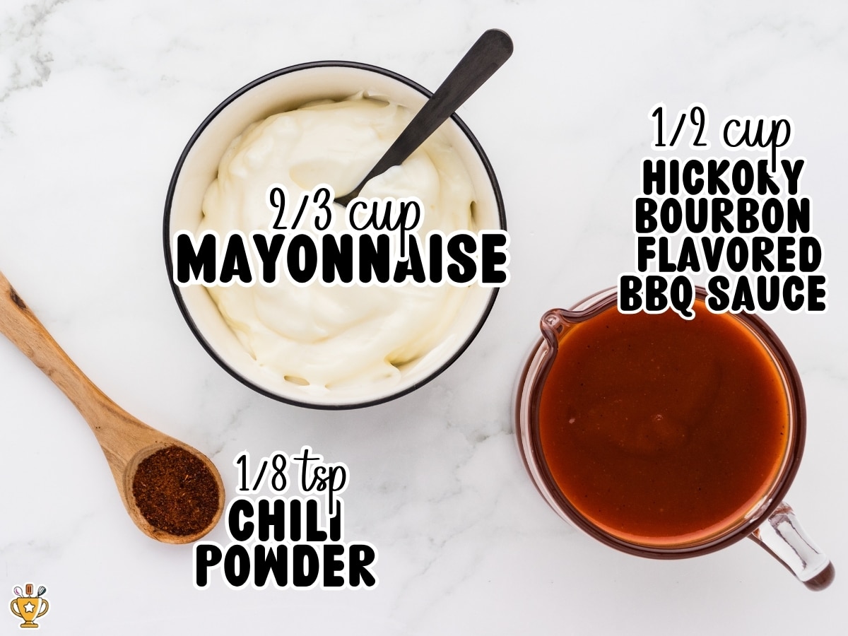 Ingredients for homemade Red Robin Campfire Sauce including ⅔ cup mayonnaise, ½ cup hickory bourbon flavored BBQ sauce, and ⅛ teaspoon chili powder arranged on a white marble surface. Text overlay labels each ingredient and measurement.