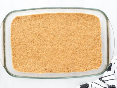 Graham cracker crust pressed into a 9x13 baking dish