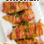 interest graphic showing Bacon Wrapped Chicken arranged on a serving platter with crispy bacon wrapped around juicy chicken breasts. Text on image reads "Bacon Wrapped Chicken" and "Sooo Juicy & Tender Recipe!"