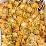 Pinterest graphic featuring a pan of homemade Cornbread Stuffing with golden cornbread and bread cubes, celery, onion, and herbs. Text reads “The Best Cornbread Stuffing” and “delicious & flavorful!”